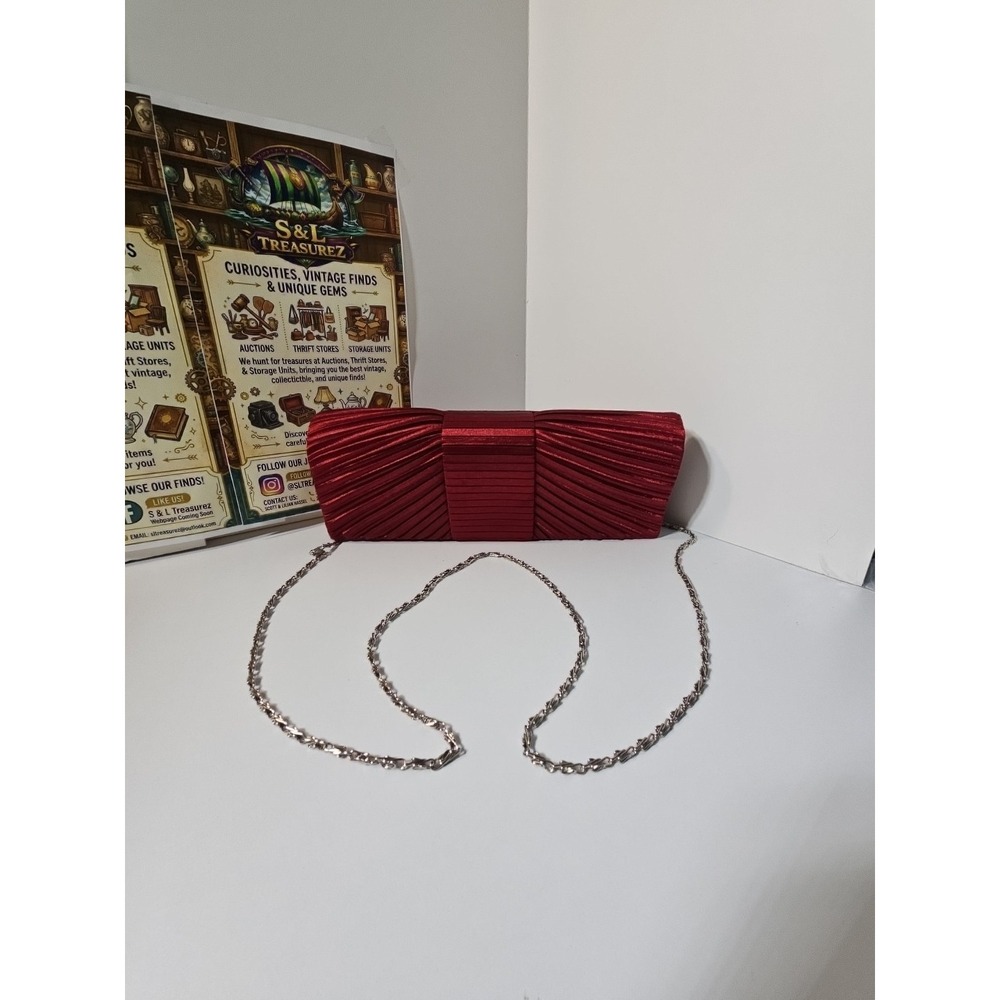 J Francis red satin  clutch handbag featuring a‎ removable shoulder chain...